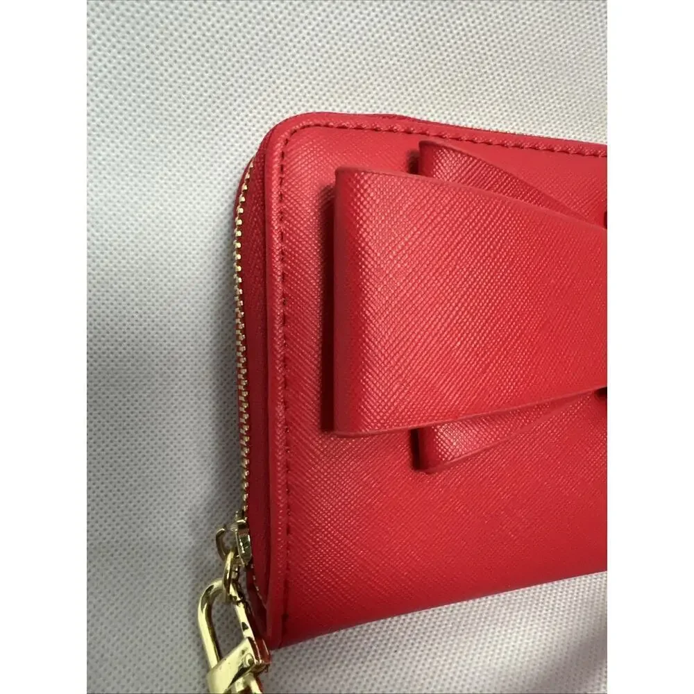 Betsey Johnson red zip around wristlet strap with bow